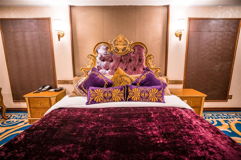 The master bedroom of the Golden No. 3 Presidential Suite on the Three Gorges Cruise