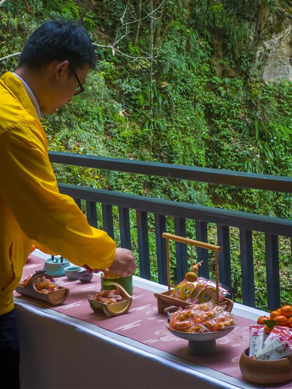 Tea served outside the passive cave in Badong
